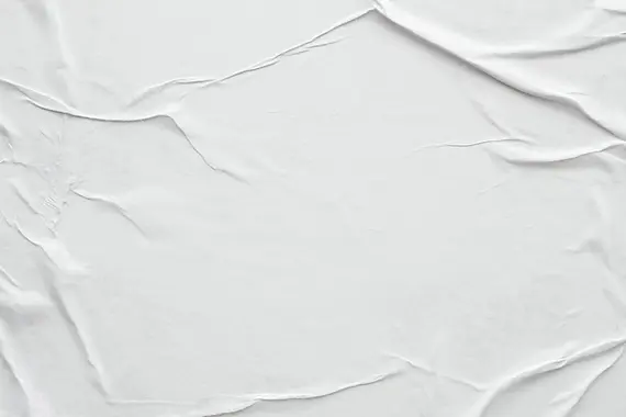 close-up-white-poster-texture.webp
