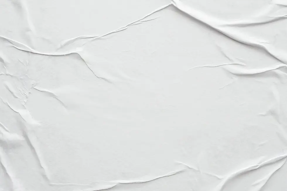close-up-white-poster-texture.webp