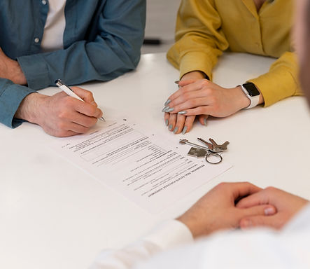 male-real-estate-agent-doing-business-showing-house-potential-buying-couple.jpg