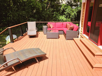 Outdoor deck built by OnDeck with Azek Vintage Collection decking and Azek Evolution railing system