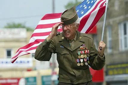 Veteran holding flag