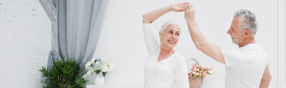 elder-couple-dancing-bedroom_edited.jpg