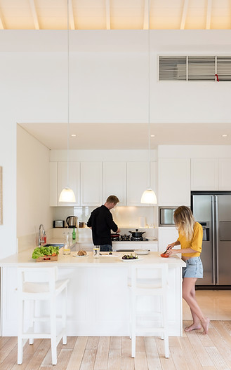 couple-making-lunch-on-a-white-kitchen-at-home-2025-01-09-01-49-17-utc.JPG