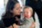 mom soothing crying child