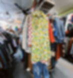 A set of clothes in a Ganddee charity shops