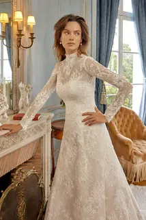 Strapless lace A-line wedding dress with detachable long sleeve lace bolero. High neck. Two looks.