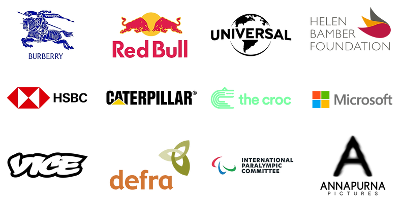 Client logos including Burberry, Red Bull, Universal, Helen Bamber Foundation, HSBC, Caterpillar, International Paralympic Co