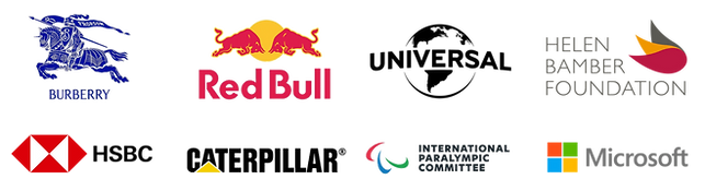Client logos including Burberry, Red Bull, Universal, Helen Bamber Foundation, HSBC, Caterpillar, International Paralympic Committee and Microsoft
