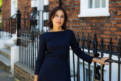 Pooja Sachdev, founder of Rewire Consulting, standing on a London street