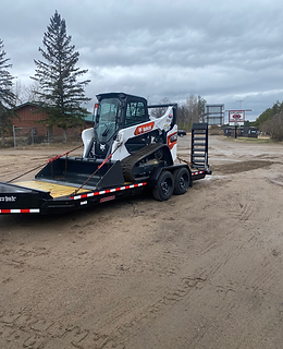 picking up the new skidsteer