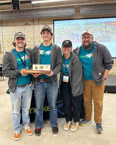 Season seven first place team the delta school holding the trophy