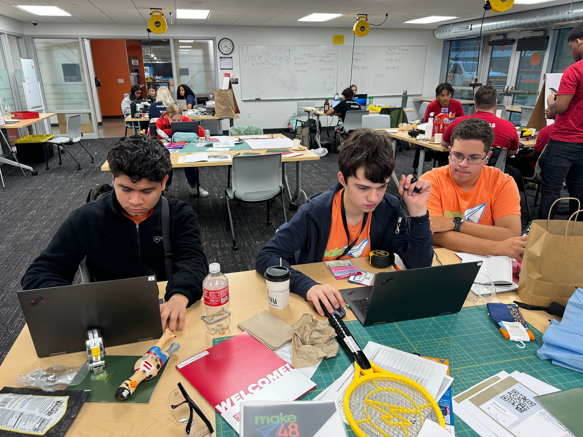 3 boys brainstorming at MSOE