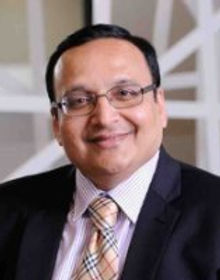 Young Man Smiling in the Office