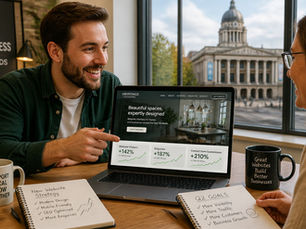 discussing Web Design Tips for Small Businesses man and woman over laptop on desk