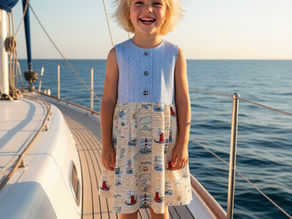 girl on boat in nautical dress by SerendipityGDDs