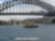 ferry under harbour bridge