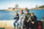 family in front of opera house