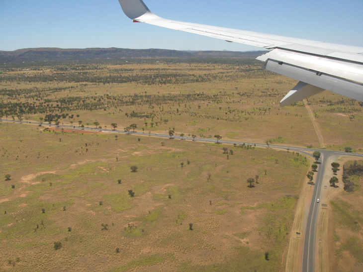 image taken from within a small plane overhead near alice springs, northern territory