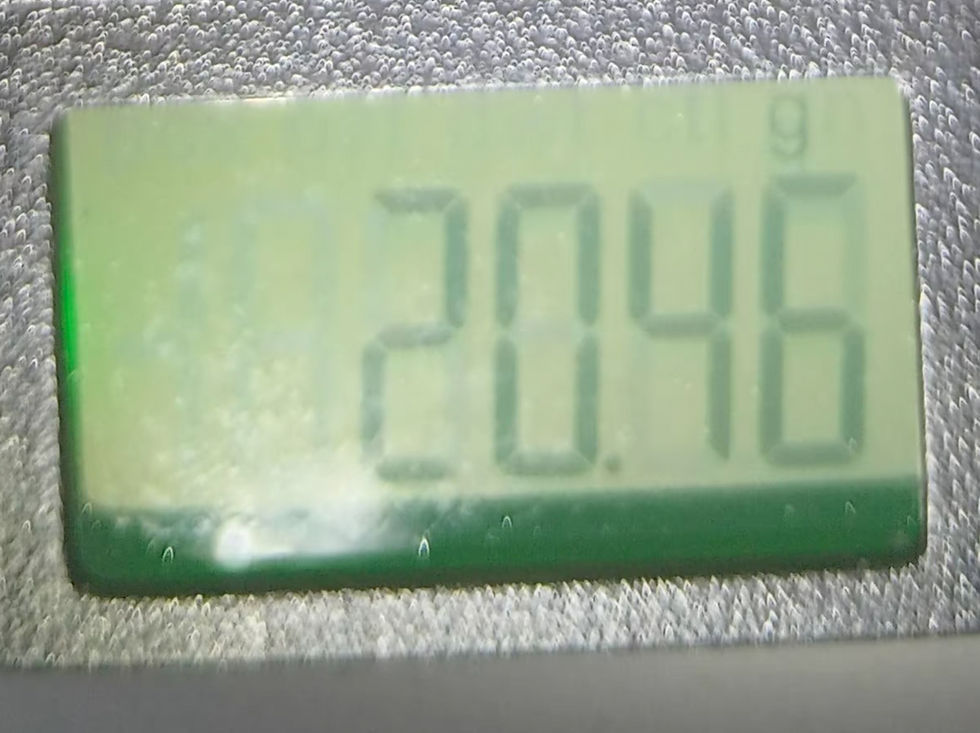 Digital scale screen showing 20.46 grams