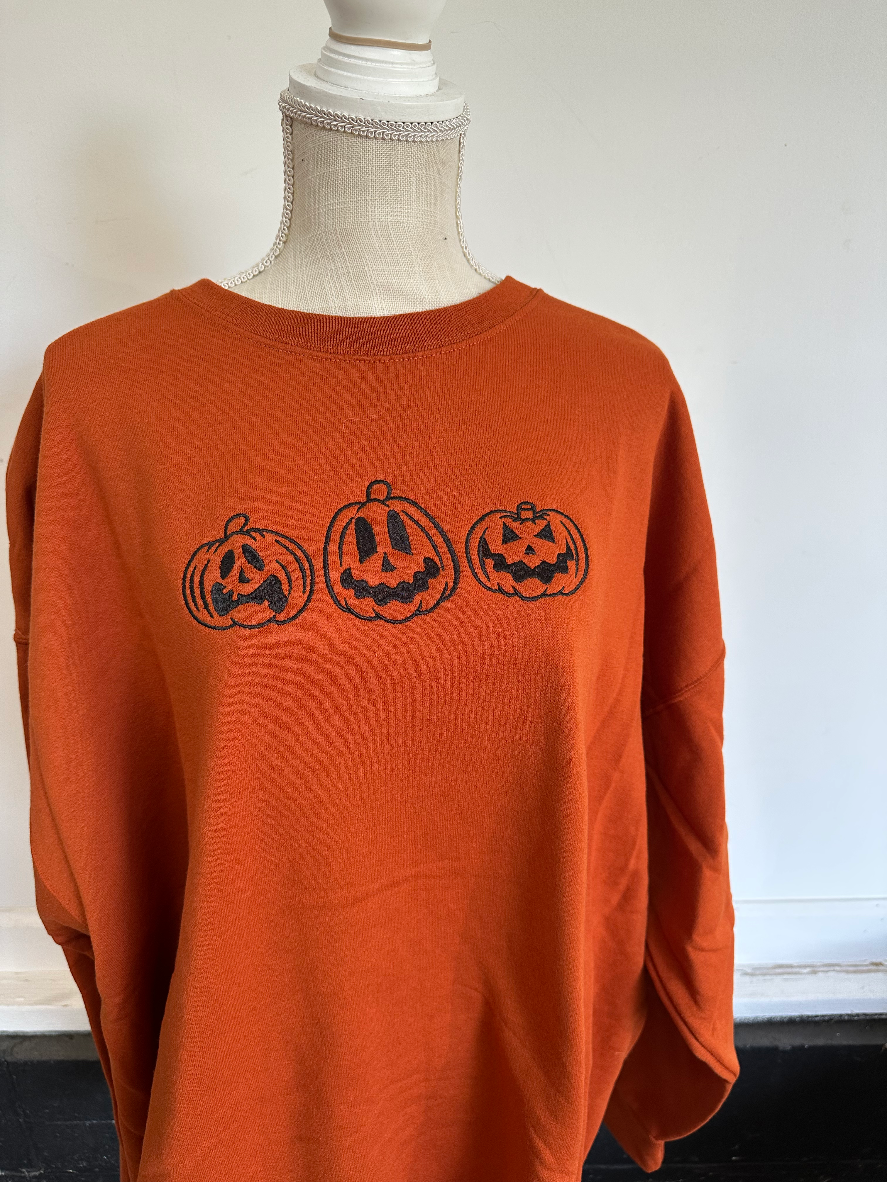 Spooky jack-o’-lanterns crewneck