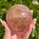Thumbnail: pink and yellow candy fluorite sphere