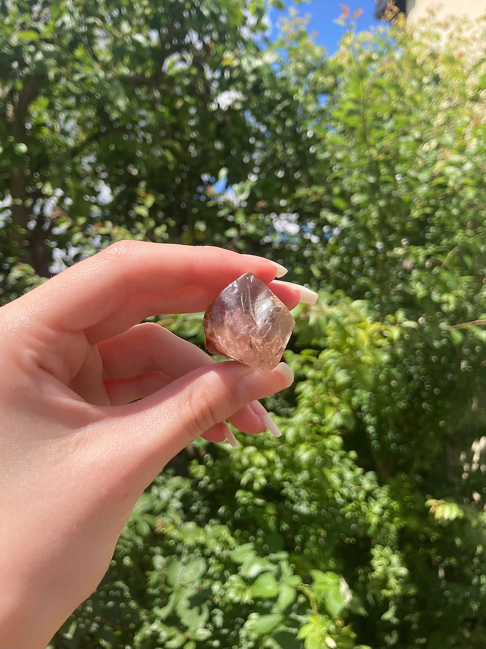 Thumbnail: amphibole quartz tumbled point 16