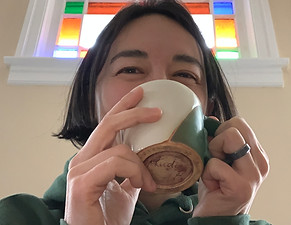 Elizabeth B Silberg drinking out of handmade mug