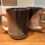 Thumbnail: small batch, wheel thrown blue with cream everyday mugs - cinnamon color