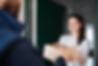 Woman receiving parcel from delivery man at the door..jpg
