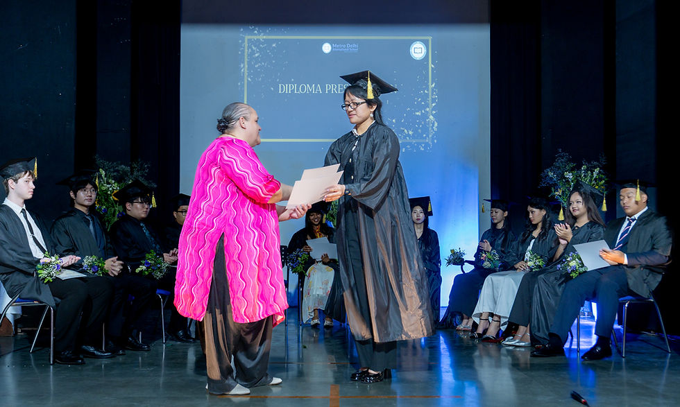 Graduate receiving diploma
