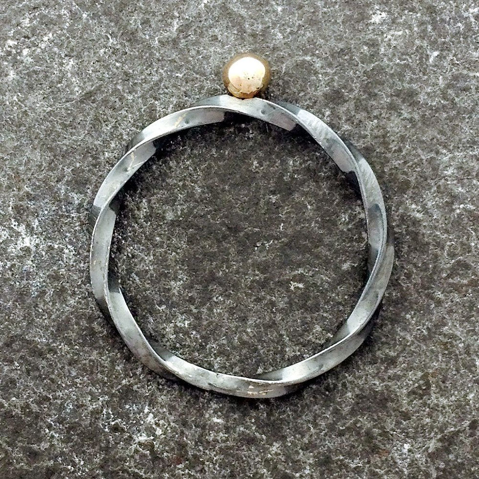 Oxidized Sterling silver and  9ct gold twist ring.