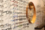 Boardwalk Optical Boutique eyewear display wall in Cambridge.
