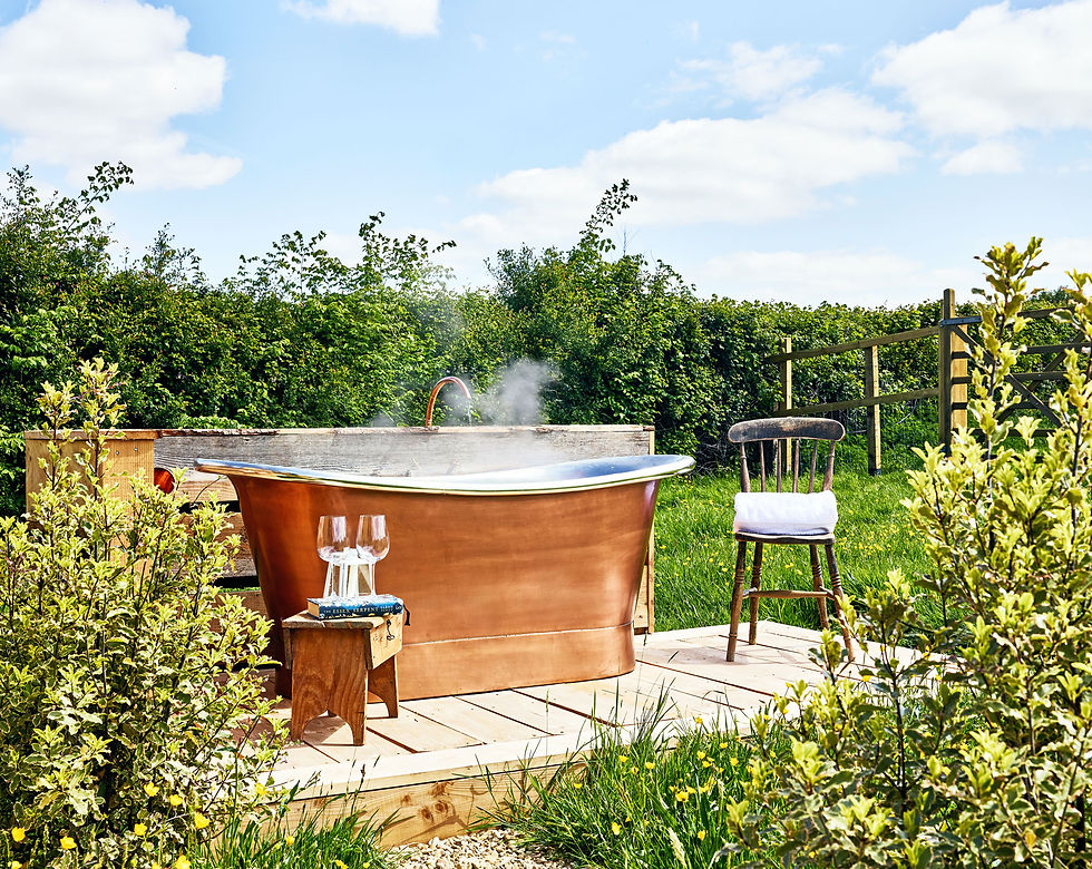Photo of: Holiday home outdoor copper bath