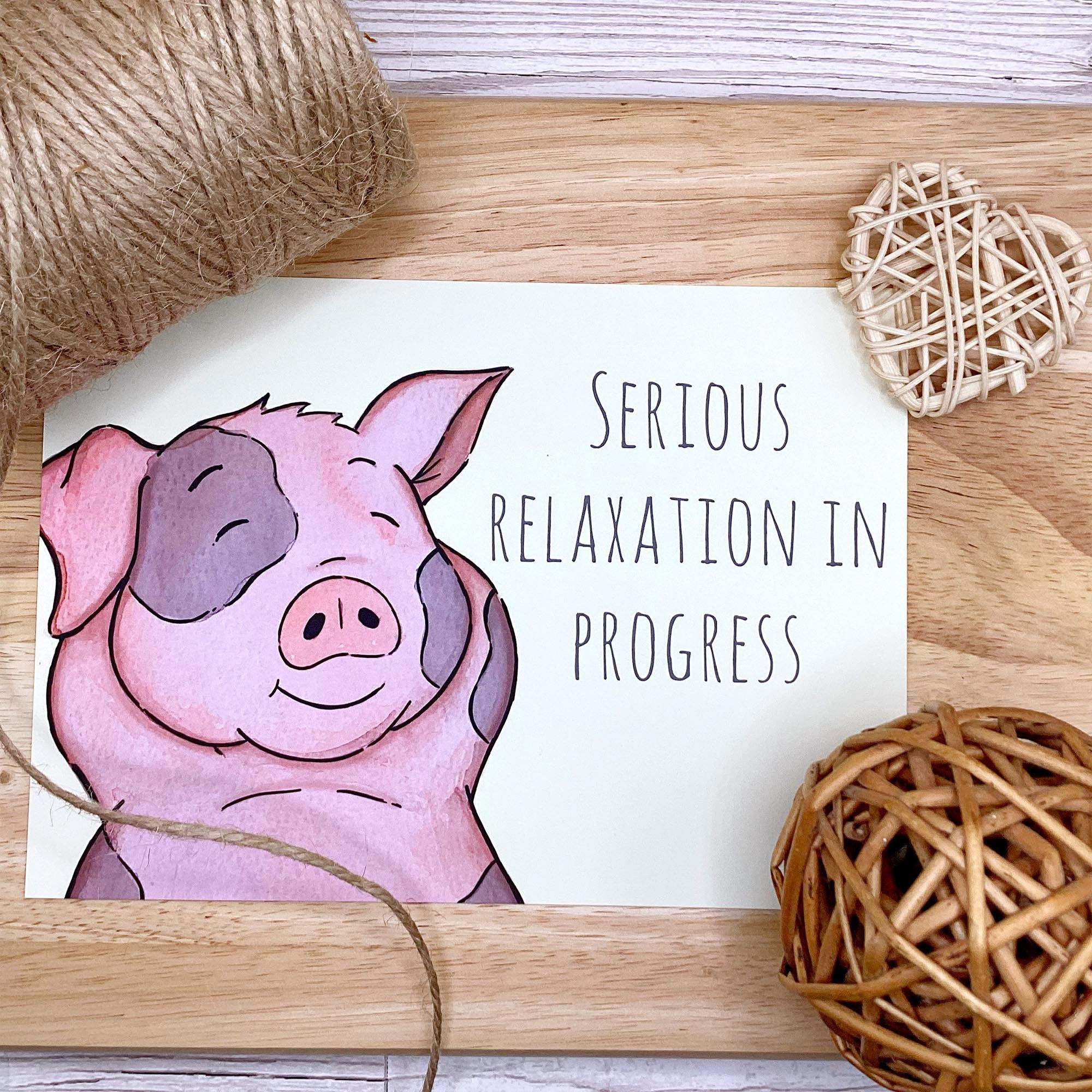 Serious Relaxation in Progress - Bramley Pig Print on Pale Vanilla Background