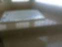 Large white soaking tub set in a tiled bathroom deck.