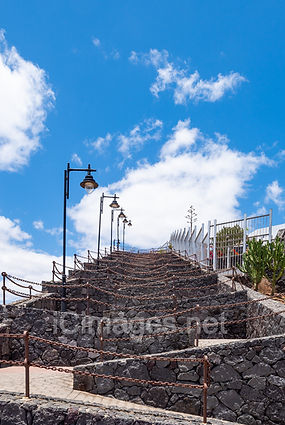 The zigzag steps in the old town of Puerto del Carmen in Lanzarote.  Many people climb these steps for a fantastic walk and a view looking down to the harbour in the old town.