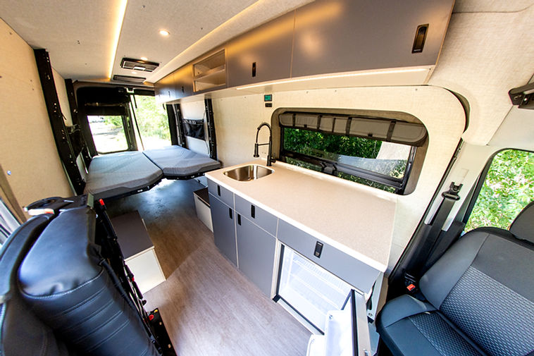 Camper Van Build by Paradigm Van Conversions Ford Transit with Adjustable Bed System Code 7
