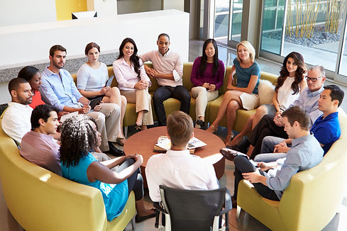 multi-cultural-office-staff-sitting-having-meeting-2021-08-26-16-12-45-utc.jpg