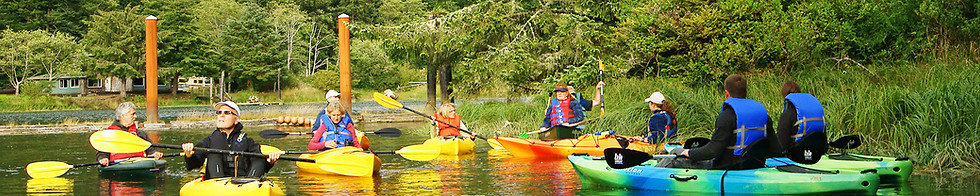 Image of kayakers on the Siletz River just south of Lincoln City, Oregon.