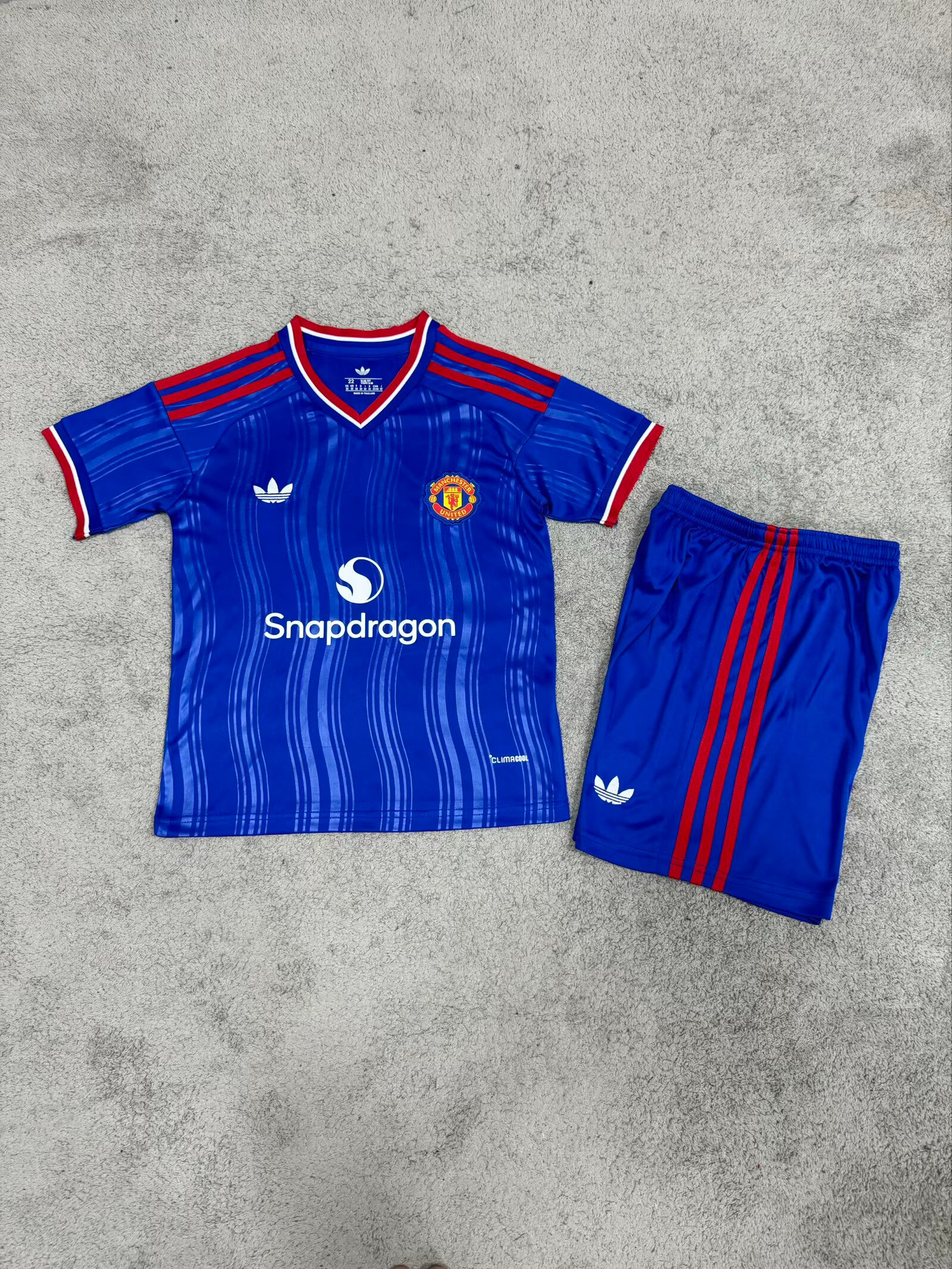 Kit Criança Manchester United Alternativa 26/27