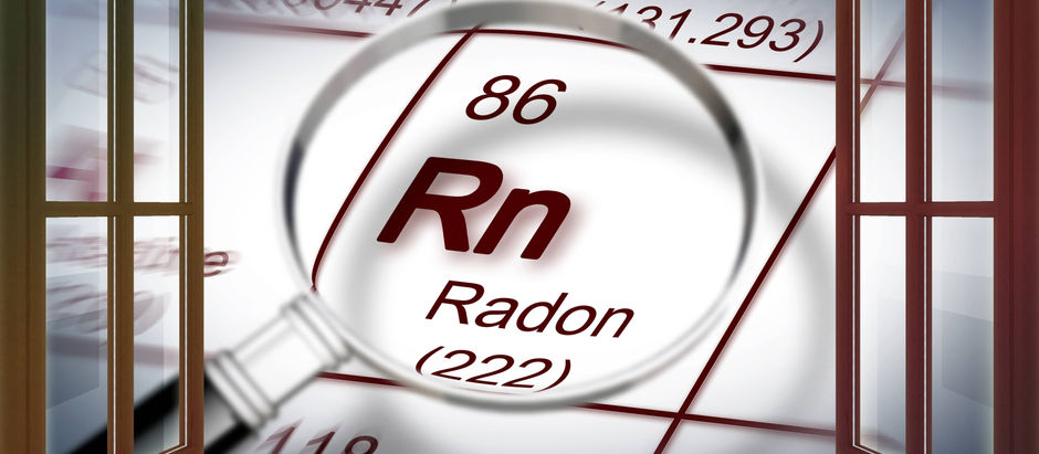 Magnifying glass enlarging the radon symbol