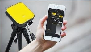Close-up view of a professional radon testing device