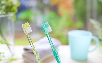 歯磨き二本とコップとタオル