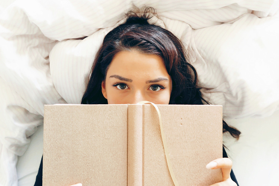 Girl Reading on Bed