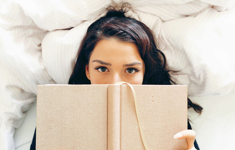 Girl Reading on Bed