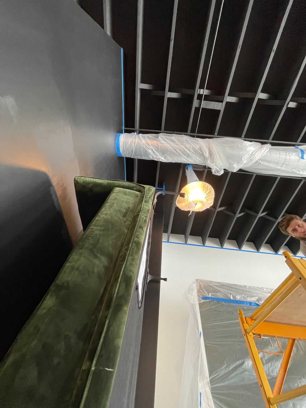 Interior house painting in Gainesville, FL, including drywall repair and trim painting for a smooth, vibrant finish