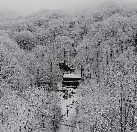 Aerial view of Buck Mountain Retreat in the snow