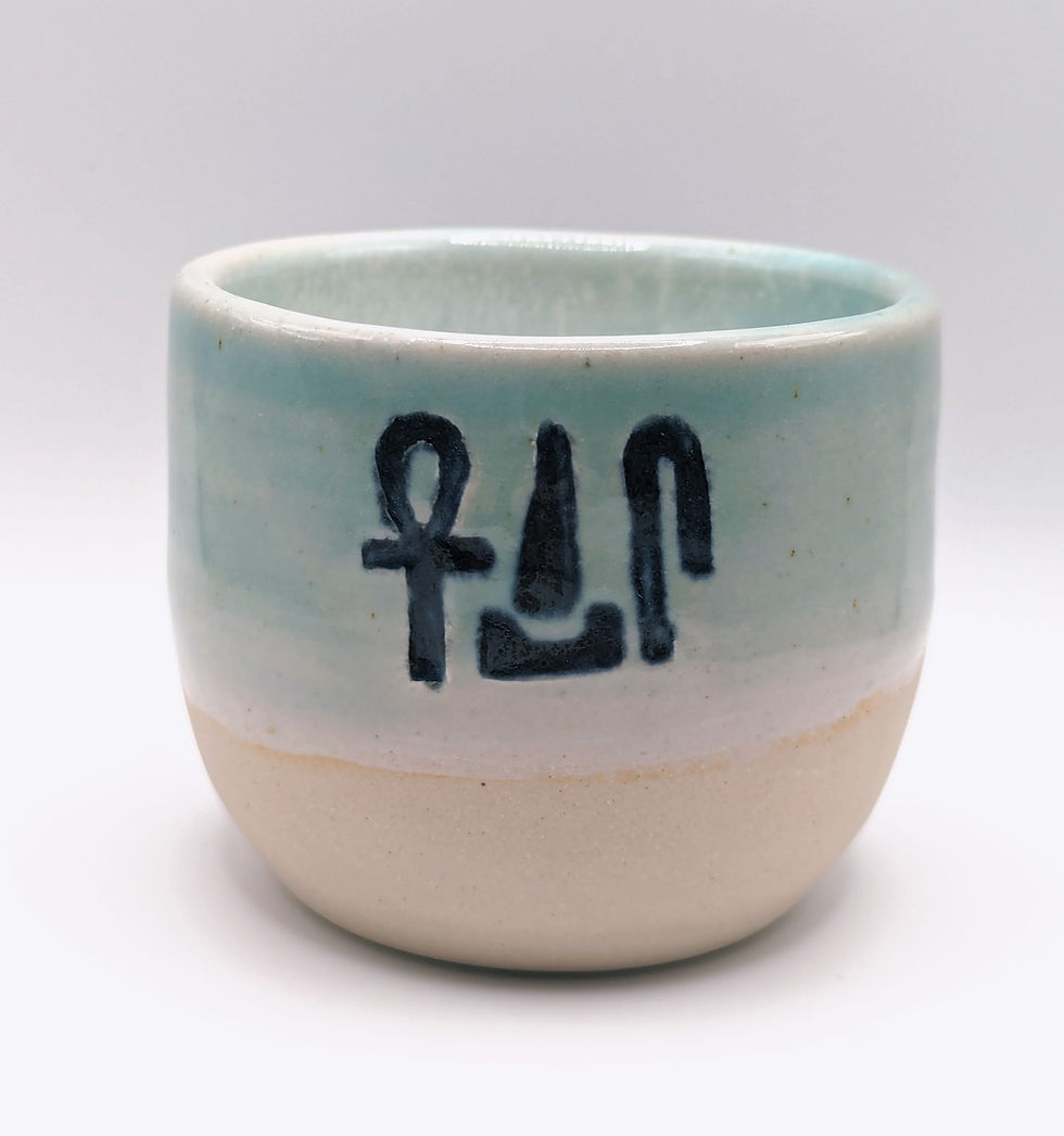 Small light teal cup
