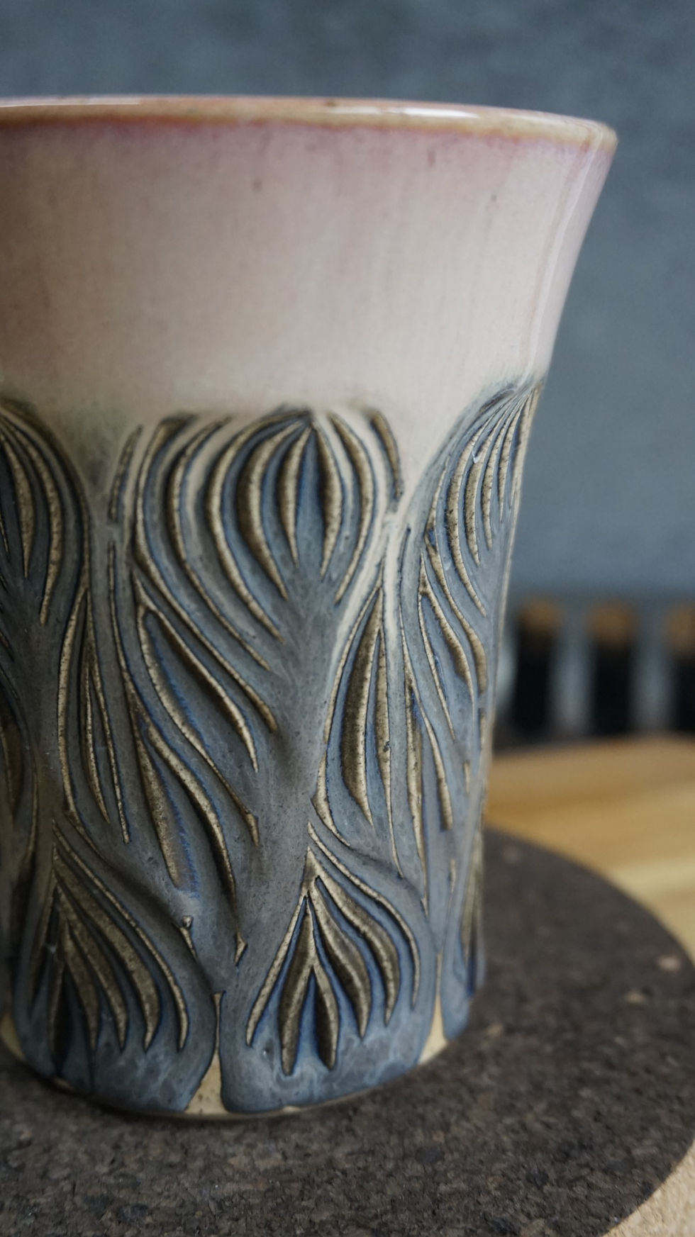 Thumbnail: Grey and pink mustachioed mug side view