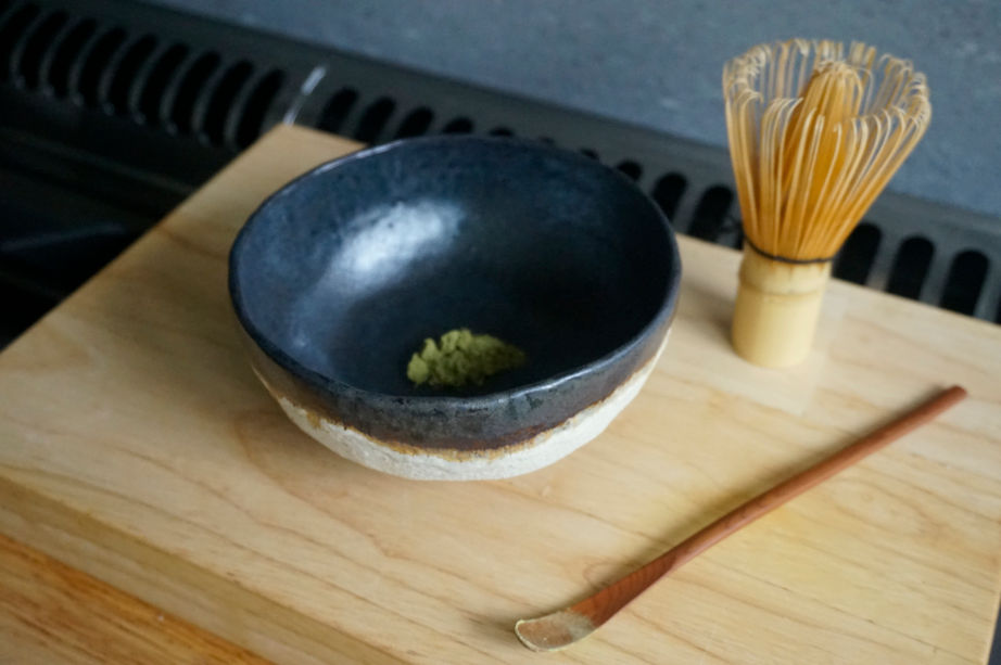 Thumbnail: Black and green Japanese-inspired tea bowl top view